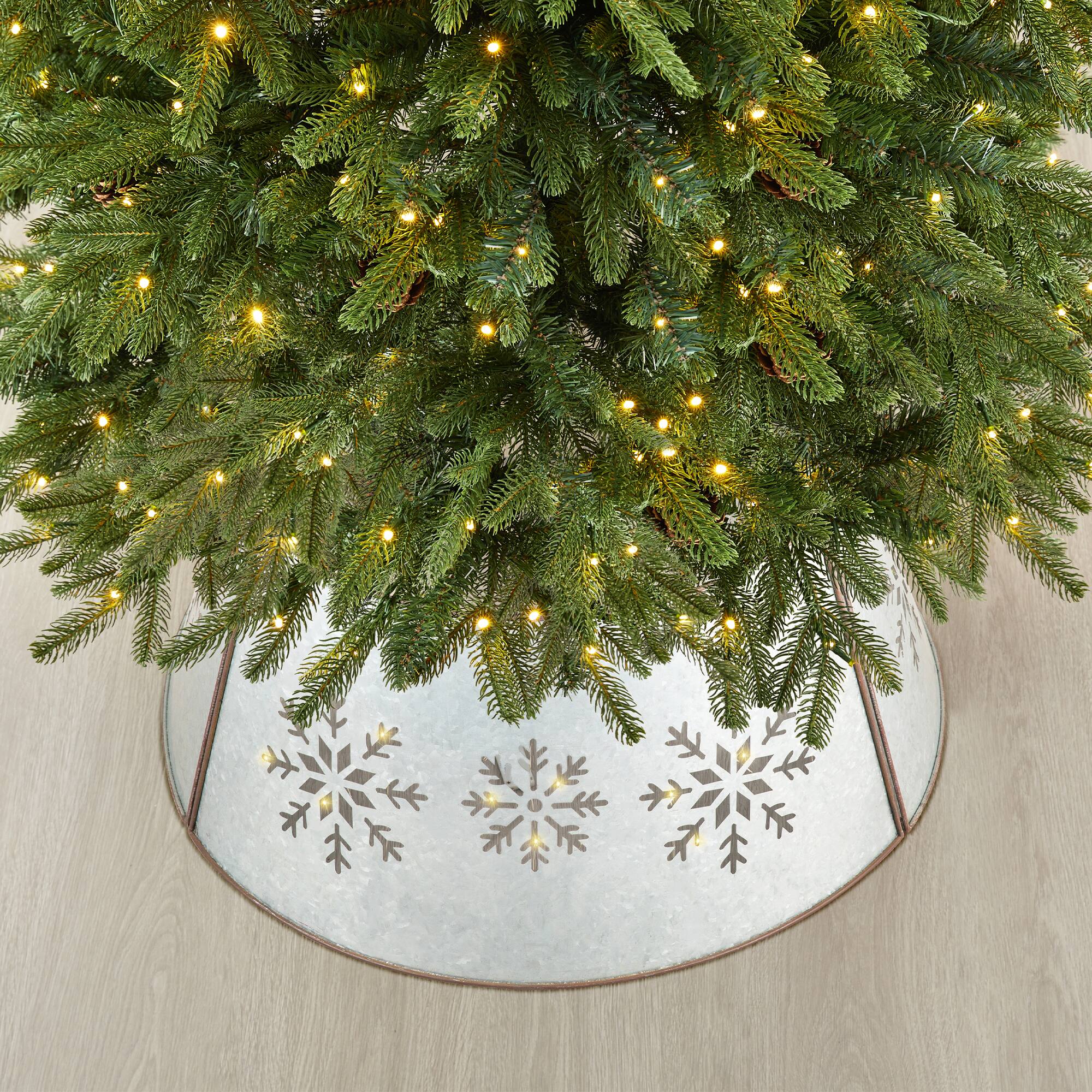 Glitzhome® Silver 26" LED Snowflake Cutout Metal Tree Collar